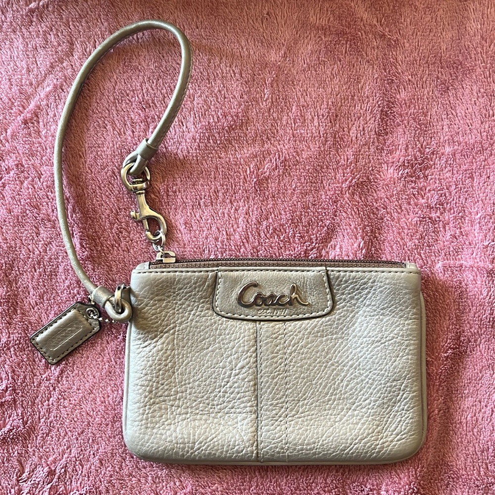 Gold Coach wristlet very good condition